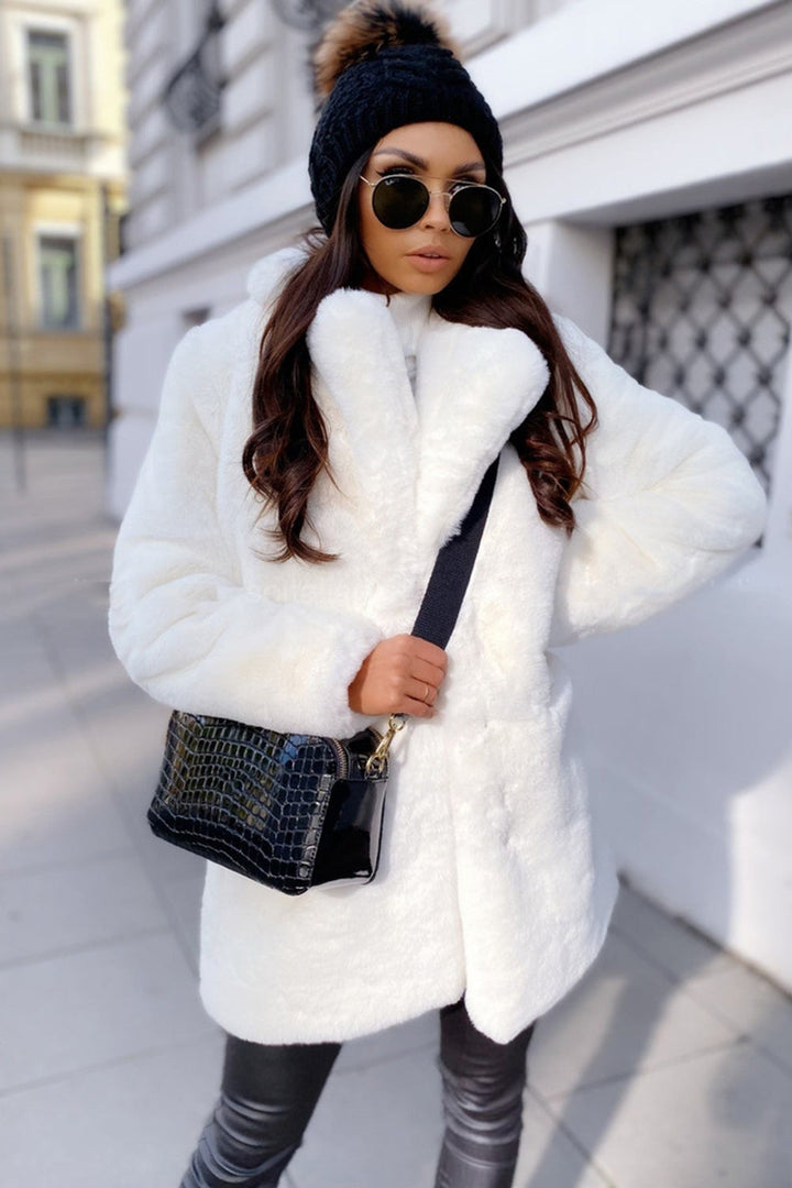 Women's coat | with fur trim in a simple cut