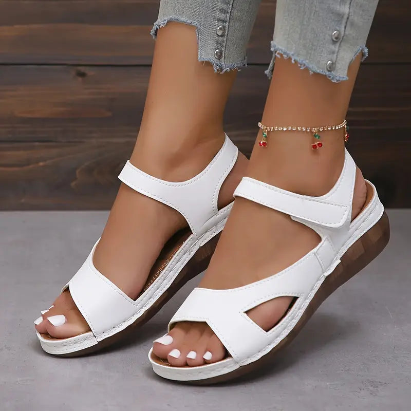 Women's sandals with straps fastened with Velcro and open toes
