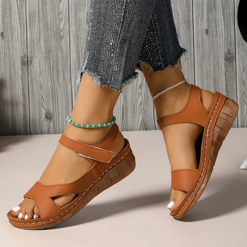 Women's sandals with straps fastened with Velcro and open toes