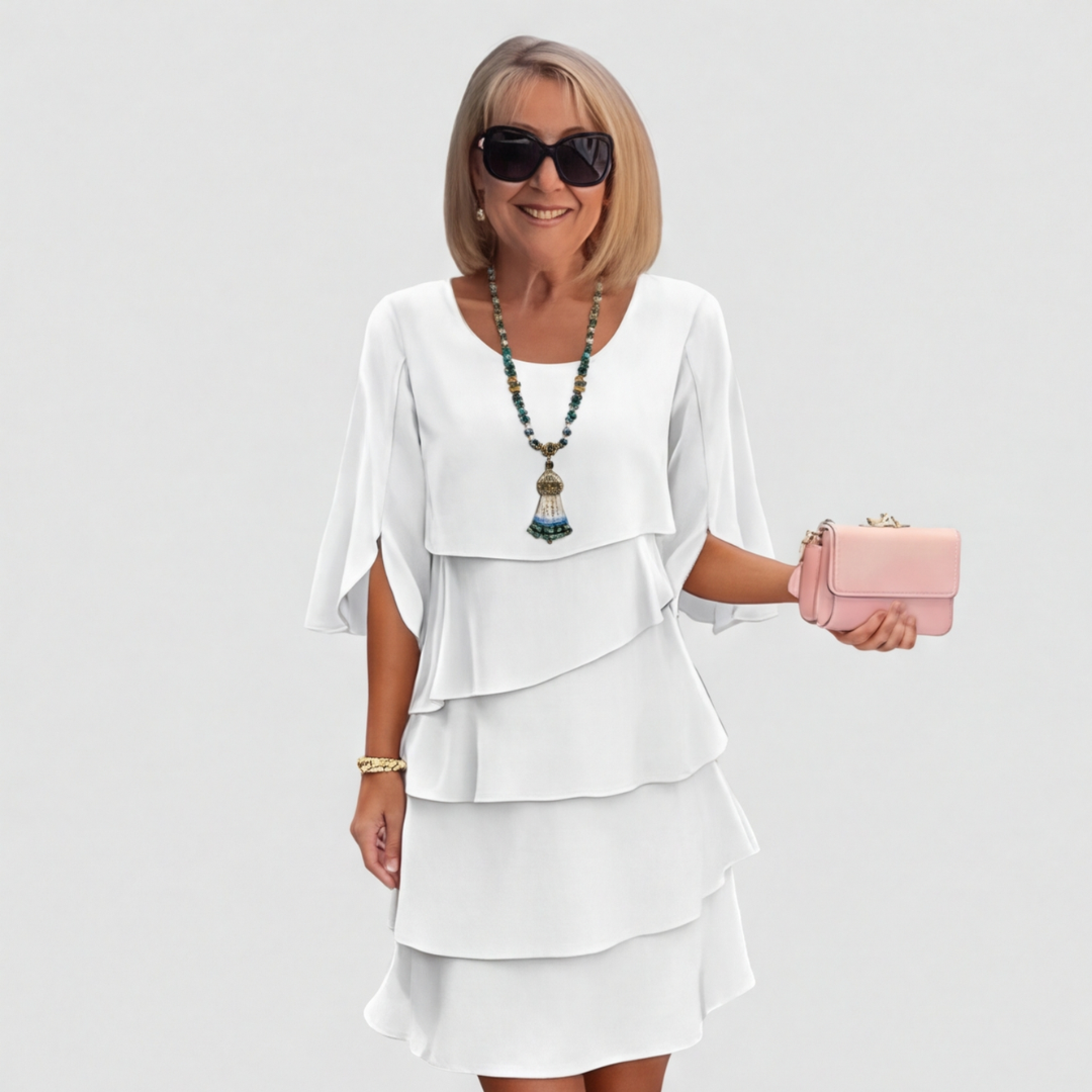 Women's dress with ruffles and three-quarter sleeves