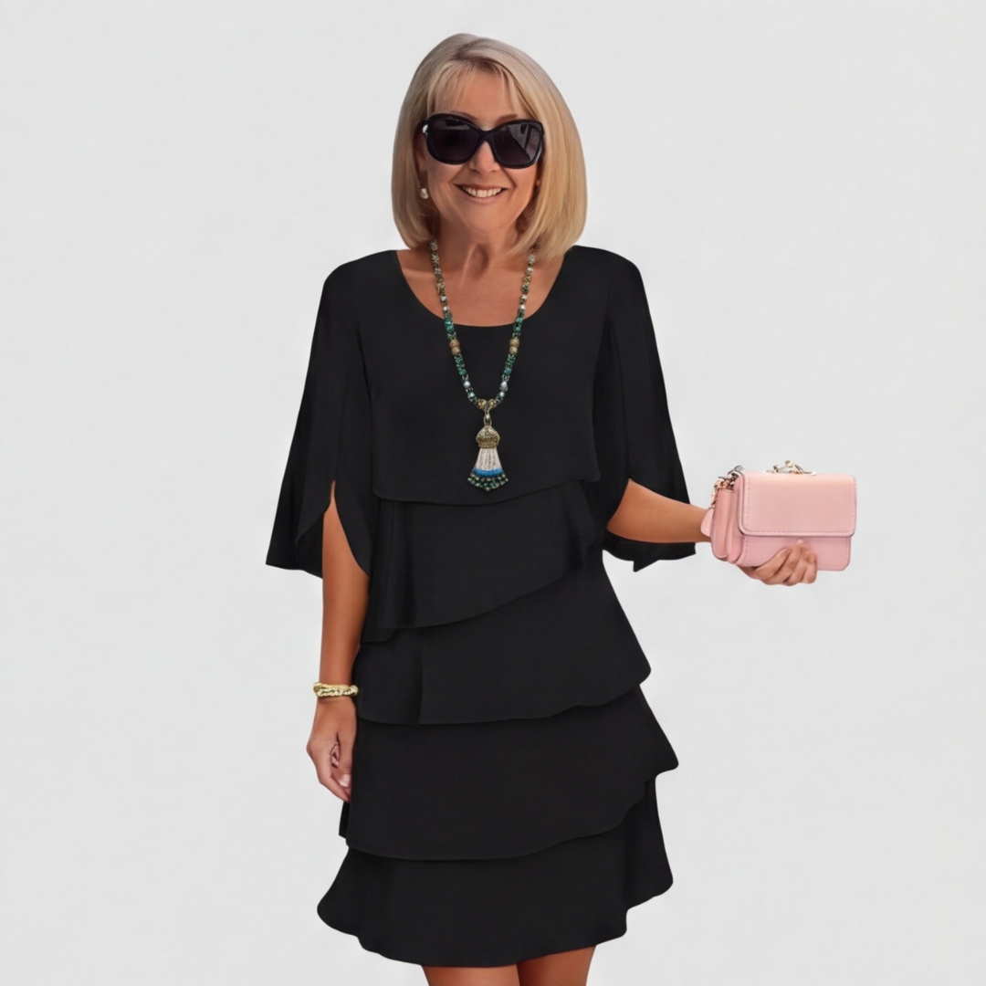 Women's dress with ruffles and three-quarter sleeves