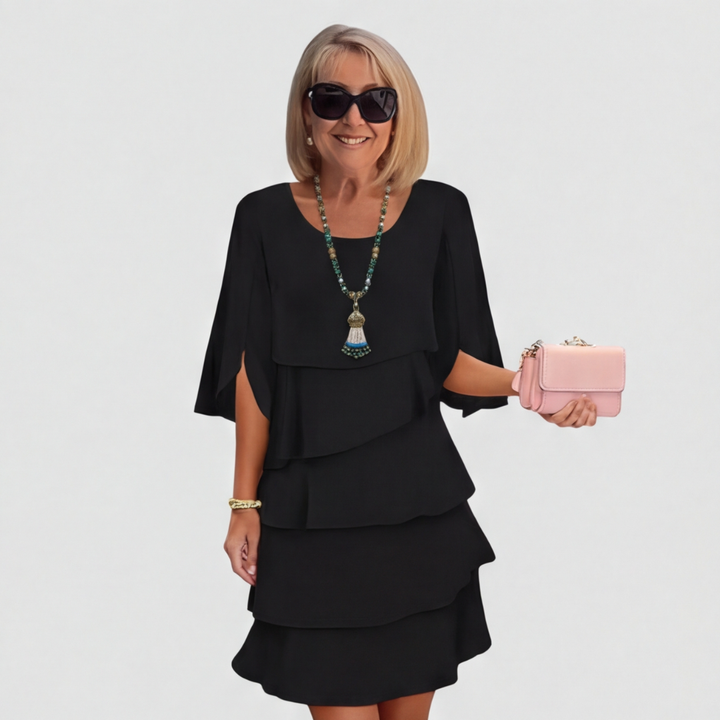 Women's dress with ruffles and three-quarter sleeves