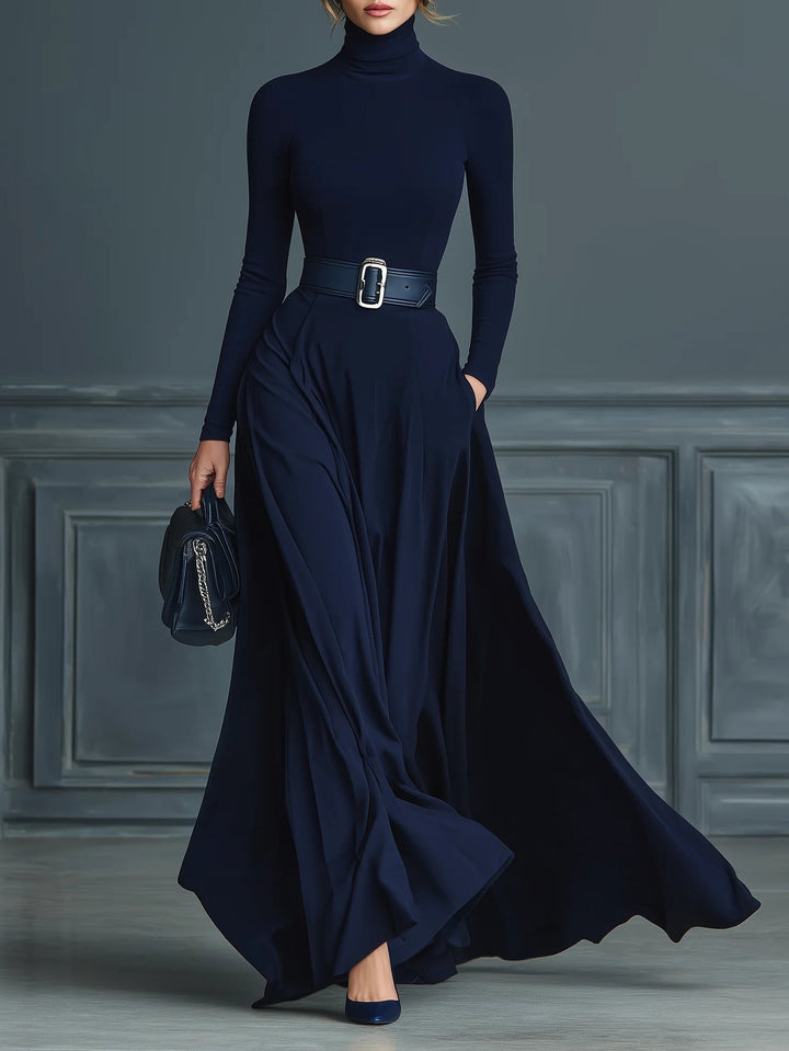 Dark blue knitted dress with a high collar