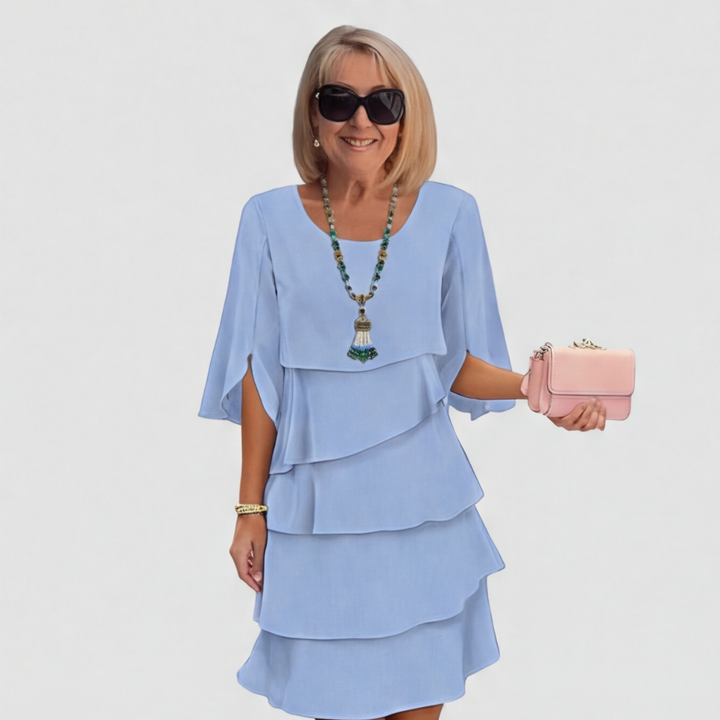 Women's dress with ruffles and three-quarter sleeves