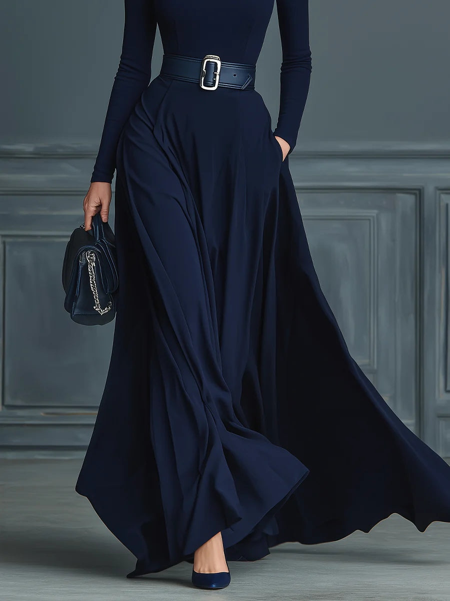 Dark blue knitted dress with a high collar