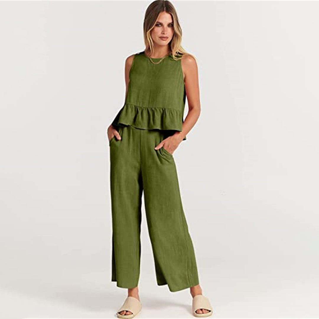 Wide women's trousers and women's blouse with ruffle