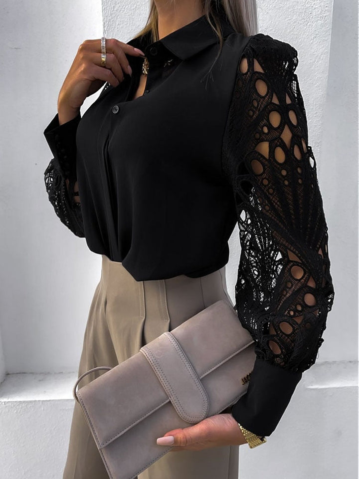 Women's blouse with a collar and lace sleeves with buttons