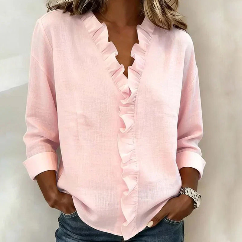 Women's blouse with ruffle at the neckline and long sleeves