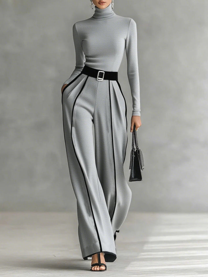 Set consisting of a turtleneck long-sleeve blouse with white accents, wide trousers, and a belt