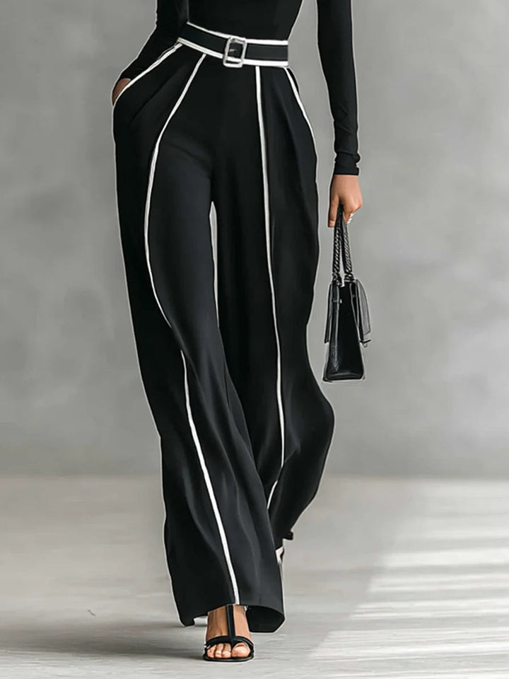 Set consisting of a turtleneck long-sleeve blouse with white accents, wide trousers, and a belt