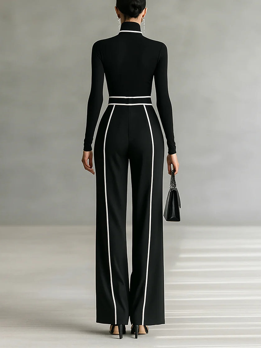 Set consisting of a turtleneck long-sleeve blouse with white accents, wide trousers, and a belt