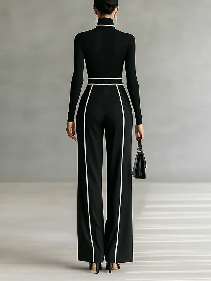 Set consisting of a turtleneck long-sleeve blouse with white accents, wide trousers, and a belt