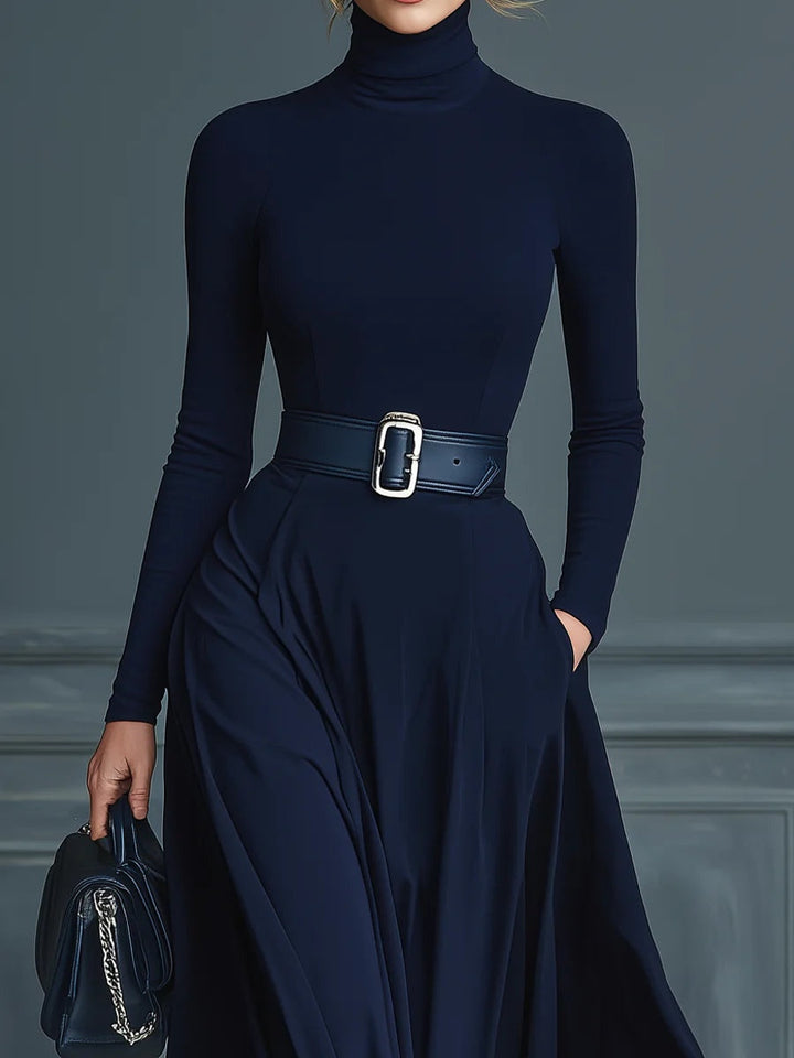 Dark blue knitted dress with a high collar