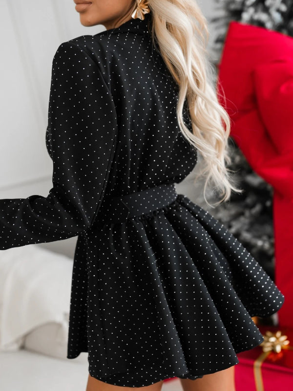 Women's dress with flaps and crystals with a belt