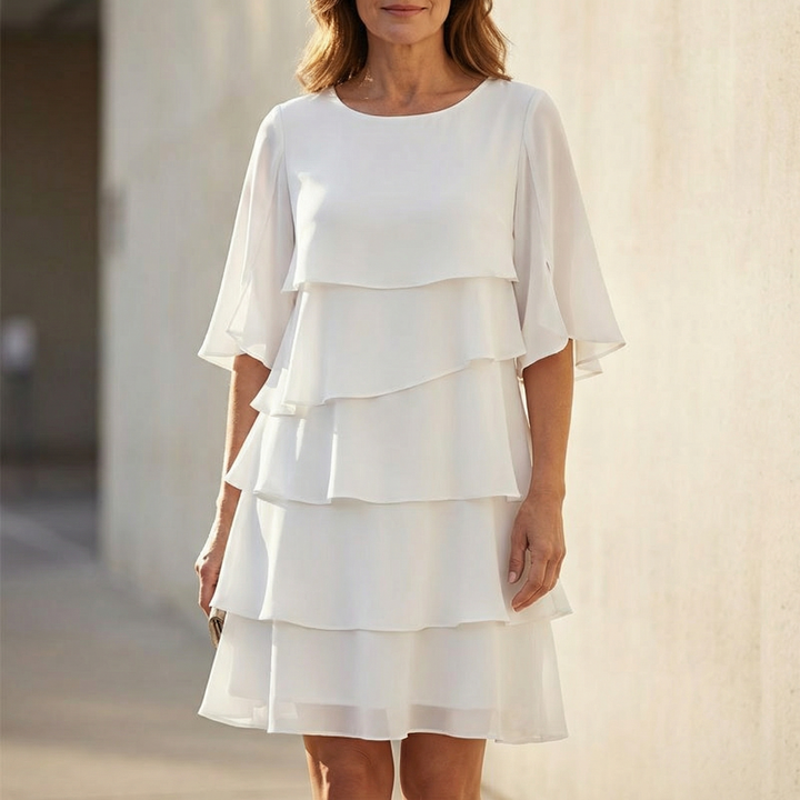 Women's dress with ruffles and three-quarter sleeves